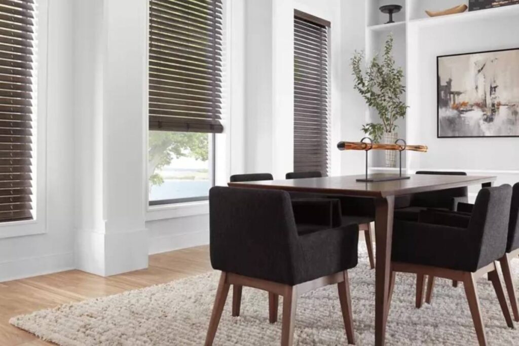 Hunter Douglas EverWood® Faux Wood Blinds in Three Dining Room Windows