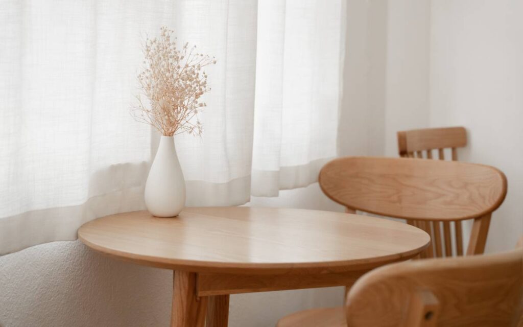 Window-length curtains near a table near Saratoga, CA